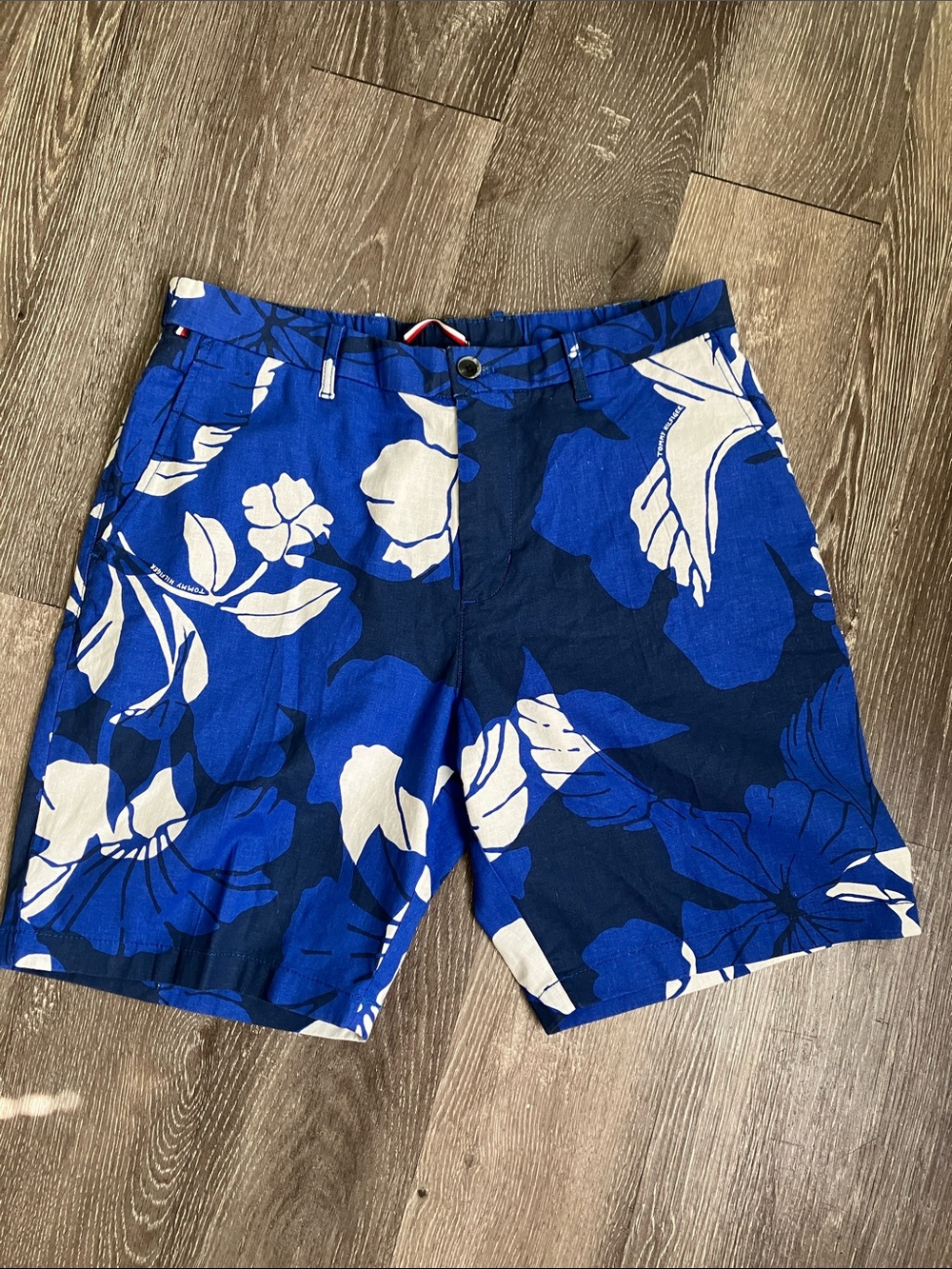 Tommy Hilfiger men's floral shorts in a blue and white allover print.